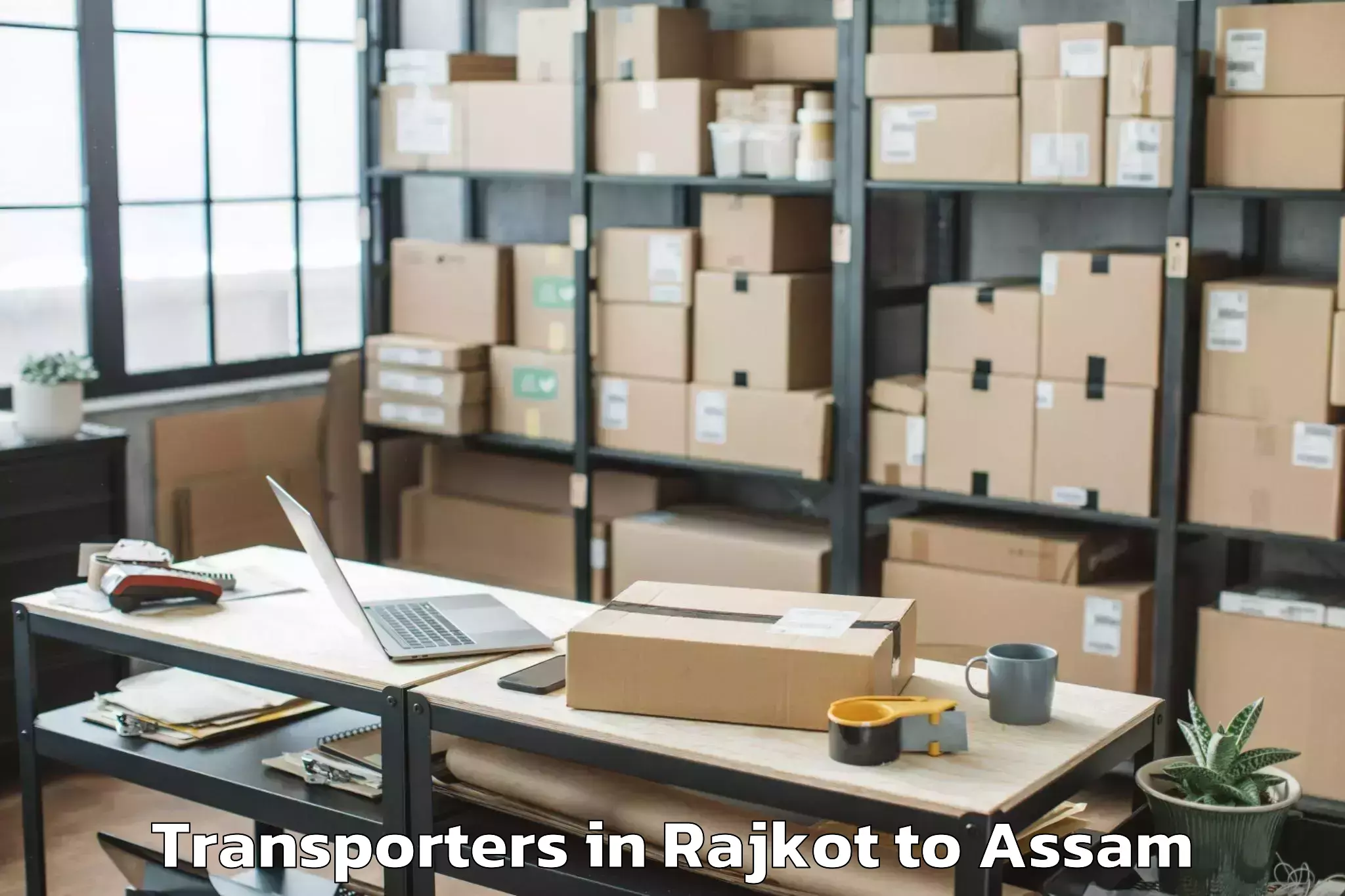 Book Rajkot to Phuloni Transporters Online